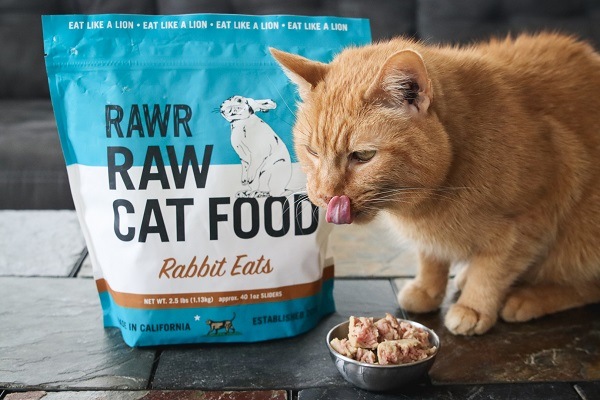 package of RAWR Rabbit Eats with ginger cat licking lips